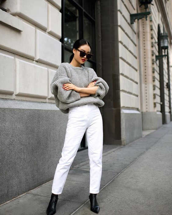 white jeans and black boots